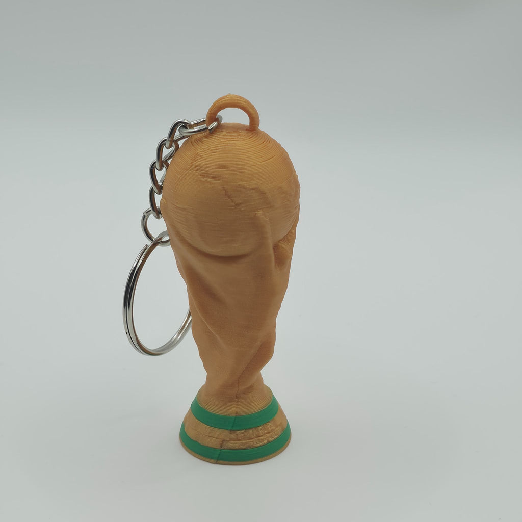 3D printed FIFA World Cup 2026 trophy keychain in gold and green by 3D Nuke Toyz