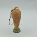 3D printed FIFA World Cup 2026 trophy keychain in gold and green by 3D Nuke Toyz