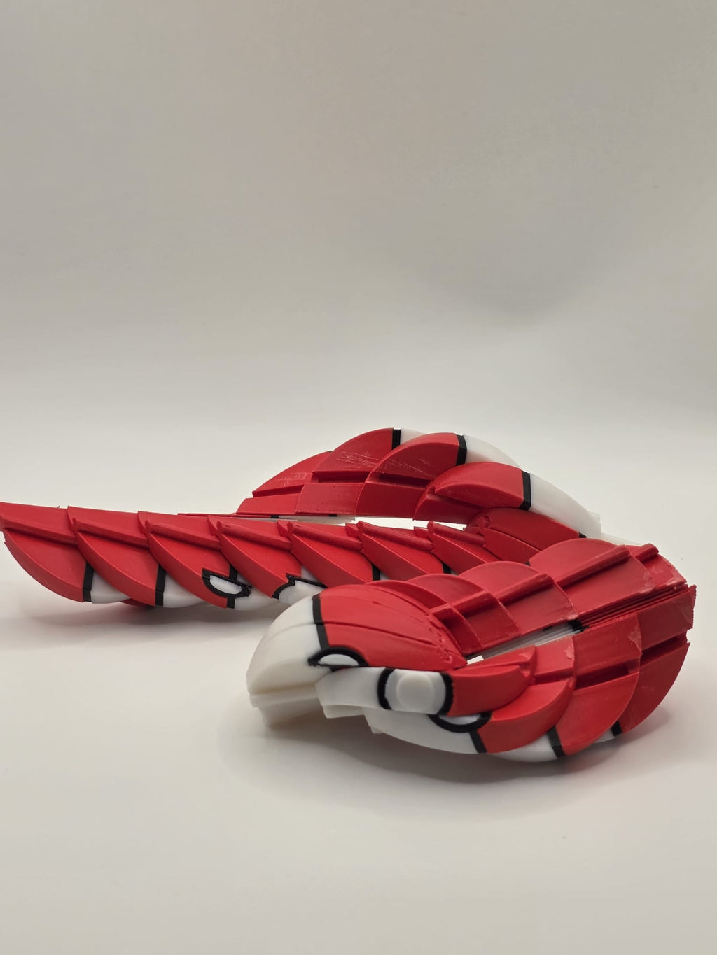 Articulated Poké Ball Fidget Toy - Flexible 3D Printed Pokémon Collectible | 3D Nuke Toyz