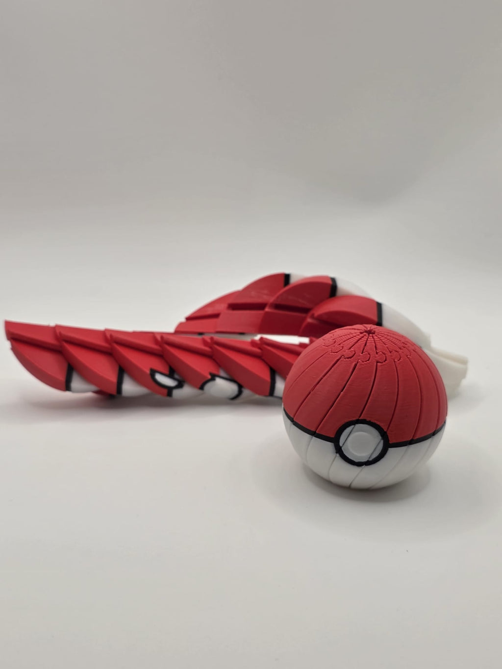 Articulated Poké Ball Fidget Toy - Flexible 3D Printed Pokémon Collectible | 3D Nuke Toyz