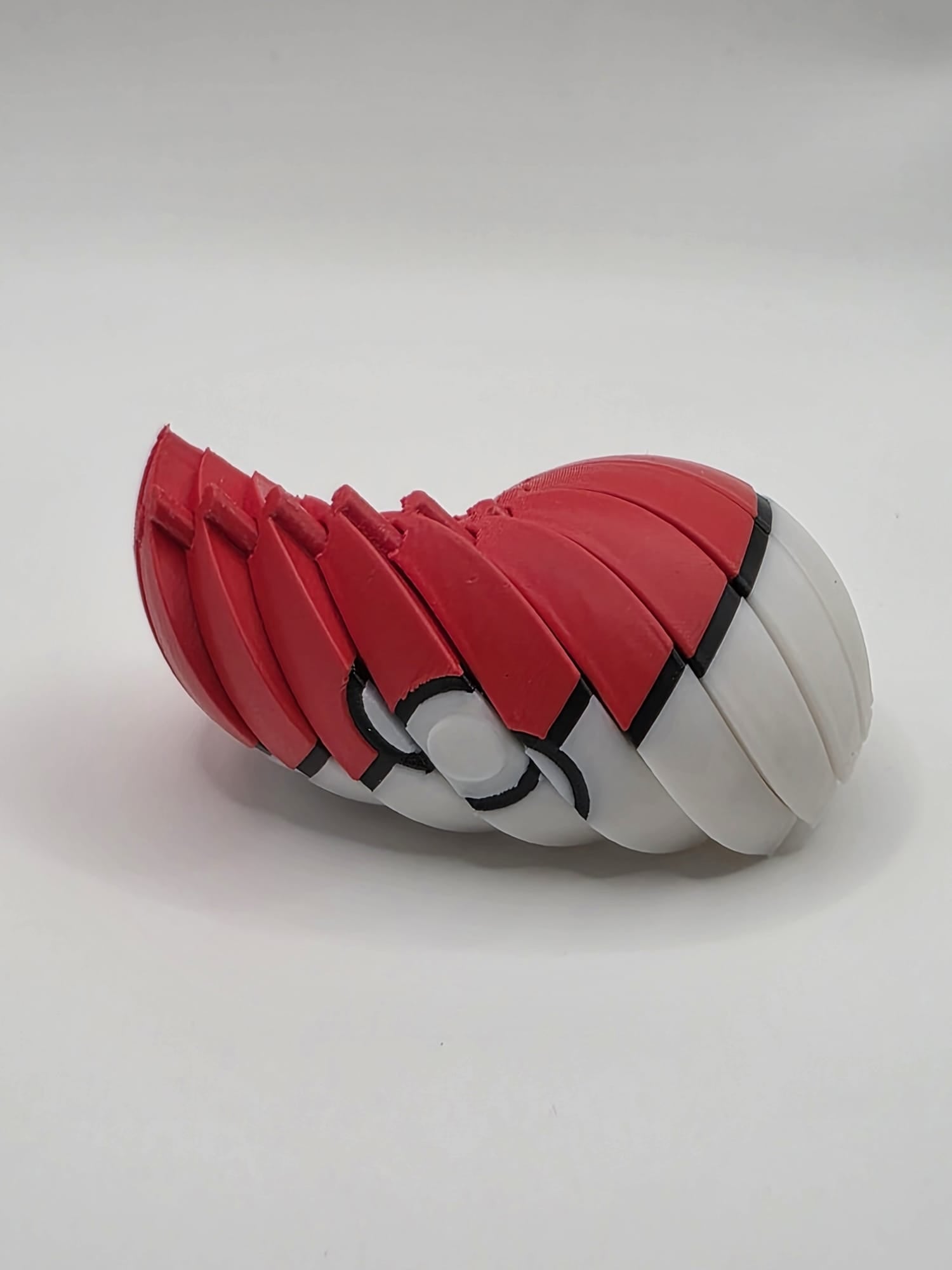 Articulated Poké Ball Fidget Toy - Flexible 3D Printed Pokémon Collectible | 3D Nuke Toyz